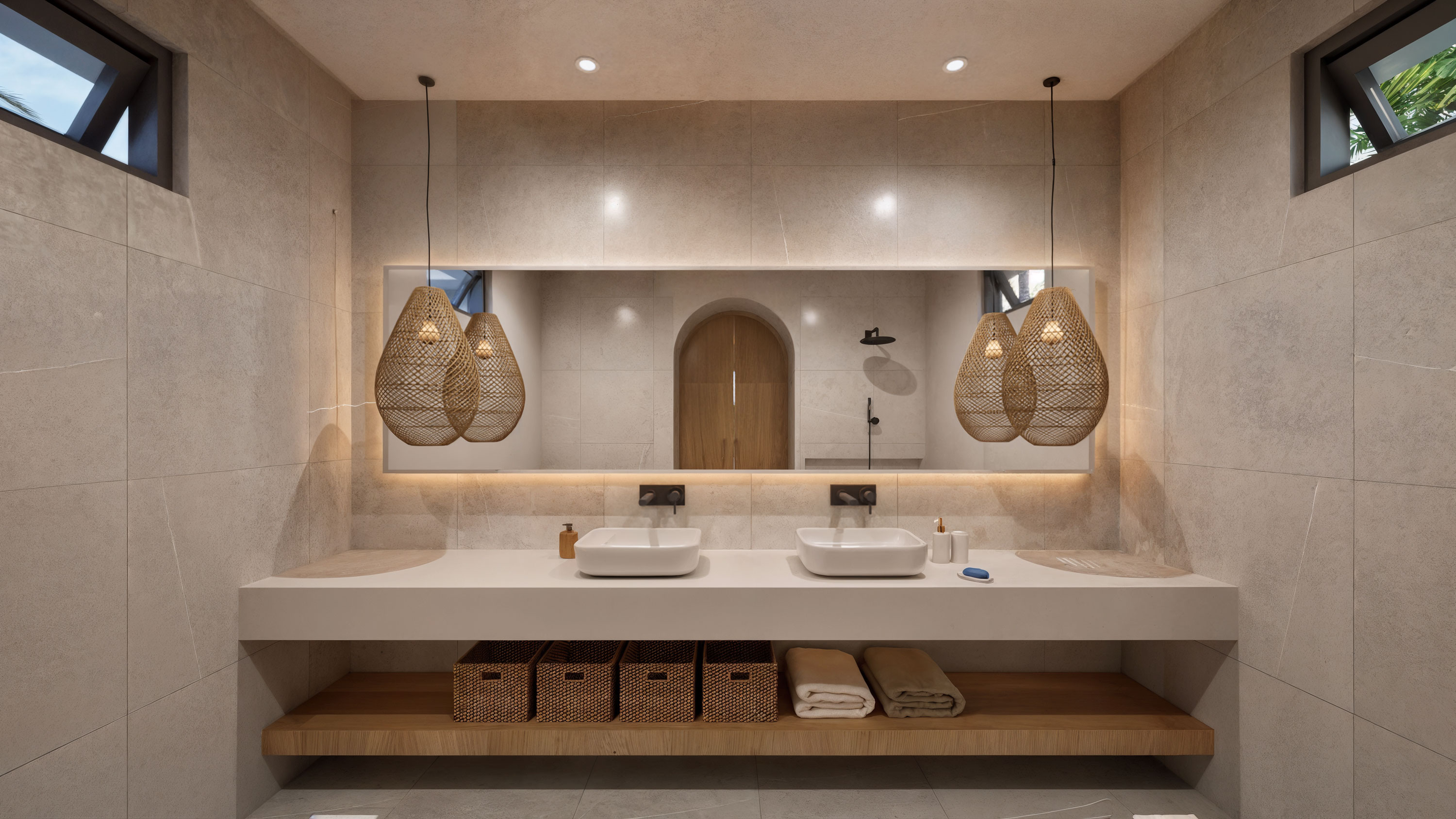 Luxury bathroom with backlit mirror and dual vanity
